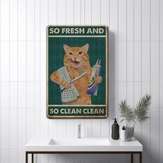 a bathroom sink with a poster on the wall above it that says so fresh and so clean