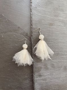 "Made of stainless steel and light colored tulle, these tassel earrings are durable and won't tarnish. Earring length is approx. 3 1/2\" long for the short option; approx. 6\" long for the long option. The round part is a quartz bead to give it some dimension.  As with any piece of jewelry, it's best to take it off before showering, swimming, or participating in rough activities, such as sports." Earrings Fabric, Drop Earrings Silver, Fabric Earrings, Steel Earrings, Earrings Drop, Silver Drop Earrings, Stainless Steel Earrings, Jewelry Inspo, Earrings Dangle