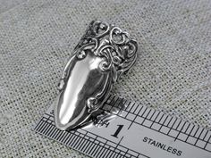 Sterling silver fingernail boho ring for the first phalanx for the pointer or upper finger, jewelry claw armor for your nail. Fingernail armor rings will protect your nails or may hide injury if your finger is damaged. The silver claws plate will completely guard your nail and protect it. Adjustable Nail Ring suitable for fingers size 17 (6.5) to 21 (11.5) size Weight: 6.5 g. Width 3.2 cm. (1.25 in.), Band width 0.4 cm. (0.15 in.) You can see other silver items here: https://www.etsy.com/shop/Kr Silver Claw Ring, Claw Armor, Armor Rings, Nail Armor, Nail Rings, Ring Armor, Nails Jewelry, Boho Nails, Piercing Inspo