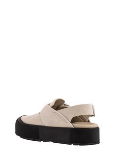 Upper: 100% Calf leather Sole: 100% Rubber Leather Flat Platform Clogs, Leather Slip-on Sandals With Removable Insole, Casual Slingback Mules With Rubber Sole, Slip-on Slingback Sandals With Rubber Sole, Modern Footbed Sandals With Textured Sole And Round Toe, Casual Suede Sport Sandals With Cushioned Footbed, Synthetic Closed Toe Sport Sandals With Leather Footbed, Flat Sport Sandals With Leather Footbed For Spring, Leather Sport Sandals With Textured Sole For Summer