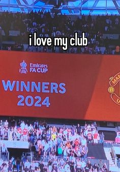 an image of the manchester united fans in the stands at the emirates rugby club, with text reading i love my club winners 2012