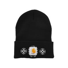 a black beanie with an egg on it