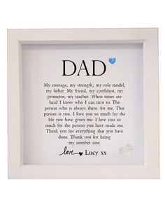 a white frame with the words dad written on it and a blue heart in the middle