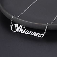 Personalized Birthstone Name Necklace is a custom made single nameplate necklace with the birthstone of your birth month. This is an appealingly beautiful necklace that gives a classy impression to the one who wears. Simply, you would love it. It provides an overall image of shining jewelry with a metallic finish. However, with the sparkling touch from our best quality graded crystal birthstone, this name necklace defines a whole new meaning to the collection of personalized name jewelry wears. Personalized White Gold Birthstone Necklace For Birthday, Elegant Silver Name Necklace With Birthstone, Customizable Elegant Nameplate Birthstone Necklace, Custom Name Silver Birthstone Nameplate Necklace, Custom Name Sterling Silver Birthstone Necklace, Silver Nameplate Birthstone Necklace, Elegant Silver Nameplate Birthstone Necklace, Personalized Nameplate Birthstone Necklace For Birthday Gift, Personalized Nameplate Birthstone Necklace For Birthday