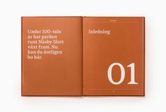 an orange book with white lettering on the front and back cover that reads, under 100 - tals ar ha marker