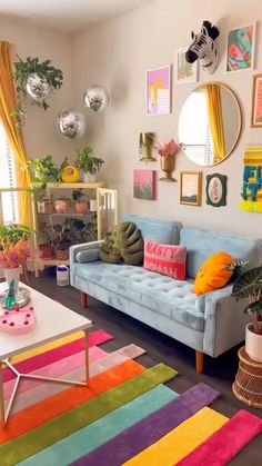 a living room filled with furniture and colorful rugs