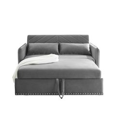 a gray couch with a white blanket on it