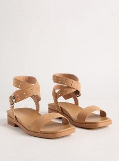 FIT Extra wide width (WW): Our unique fit gives you extra wide width and extra room around your whole foot. Extra cushioned footbed. MATERIALS + CARE Man-made materials. . 75% polyurethane, 25% metal. . Imported. . DETAILS Ankle wrap. Studded. . The best plus size women's studded ankle wrap sandal (ww) sandals in tan made of suede. Rock your look from Torrid to Festivals like Coachella and Lollapalooza, a concert, a show, or just for fun! Wide Width Round Toe Sandals For Summer, Wide Width Summer Sandals With Round Toe, Spring Wide Fit Sandals With Round Toe, Spring Wide Width Round Toe Sandals, Wide Sandals, Ankle Sandals, Ankle Wrap Sandals, Unique Fits, Wrap Sandals