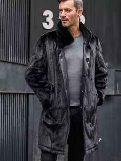 Men's Double Sided Long Fur Shearling Leather Coat In Black With this men's long fur shearling leather coat, you can up your winter look. This double-sided jacket is expanded in length and is made of genuine sheepskin leather with a semi-aniline finish and faux shearling lining. It delivers timeless warmth and sophistication in classic black and features a button fastening, a turn-down collar, and useful pockets. Outer Shell: Real Leather Leather Type: Sheepskin Leather Finish: Semi-aniline Inner Shell: Faux Shearling Feature: Double Sided Long Jacket With Black Fur Closure Style: Button Collar Style: Turn Down Inside Pockets: Two Outside Pockets: Two Side Pockets Color: Black Luxury Black Sheepskin Fur Coat, Black Sheepskin Fur Coat With Faux Fur Lining, Luxury Black Long Fur Coat, Black Sheepskin Long Coat, Black Sheepskin Fur Coat For Winter, Black Sheepskin Fur Coat For Cold Weather, Black Shearling Fur Coat For Cold Weather, Black Long Winter Fur Coat, Black Long Faux Fur Coat