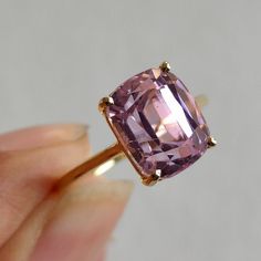 ITEM DESCRIPTION: >>The Ring is made from Solid 14K Yellow Gold. Gemstone used is absolutely natural and ethically sourced.  >>Natural Kunzite in rectangle octagon shape is studded on it with utmost precision.  Gem: Kunzite Gem size: 9x11 mm  Gem weight: 5.38 carat Gold purity: 14K (58.33% approx.) Gold weight: 1.16 grams Gross weight :  2.24 grams The Gold purity is guaranteed and it comes with authentic 14K gold hallmark. Since these Rings are handmade, they are Nickel/Lead FREE.  CUSTOMISATIO Luxury Kunzite Engagement Ring, Luxury Kunzite Jewelry In Yellow Gold, Kunzite Jewelry, Kunzite Ring, Gold Pendent, Solid Gold Charms, Handmade Jewelry Box, Green Amethyst Ring, Ring Gifts