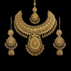 India Necklace India bridal jewelry set South India Jewellery Pakistani Necklace India Choker Temple Necklace and earrings wedding Jewelry This is a Beautiful Gold Plated Necklace India Jewelry Set which you can easily match with your Indian Outfits. Buy this India Wedding Set from AgulkaJewels, and make a unique collection. *PRODUCT DETAIL* *Material: Brass *Plating: 22K Antique Gold Plated *DIMENSIONS * *Necklace:- Weight: 165 gm, Drop Length:- 7.5 Inches, Width: 3.7 Inches. *Earrings:- Weight Gold Jewelry Wedding Bridal Sets, Bridal Necklace Set Gold, Beautiful Gold Necklace Bridal Jewelry, Gold Jewelry Set Design, Gold Set Designs Jewelry Unique, Pakistani Gold Necklace, Antique Gold Jewelry Indian Bridal Jewellery Necklace Set, Gold Jewellery Set Design, Gold Set Bridal