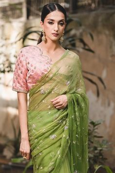 Light green chiffon saree with floral zari embroidery all over. Comes with unstitched blouse piece. 
Components: 2
Pattern: Embroidered
Type Of Work: Floral
Fabric: Chiffon
Color: Green
Other Details: 
Floral embroidery
Note: The stitched blouse worn by the model is not for sale
Occasion: Destination Wedding - Aza Fashions Festive Semi-stitched Pista Green Blouse, Traditional Green Pre-draped Saree With Sheer Dupatta, Festive Green Georgette Pre-draped Saree, Green Pre-draped Saree With Sheer Dupatta For Eid, Pista Green Chanderi Blouse Piece For Reception, Semi-stitched Green Organza Traditional Wear, Pista Green Blouse With Sheer Dupatta For Reception, Festive Pista Green Pre-draped Saree With Chikankari Embroidery, Green Organza Pre-draped Saree With Dupatta