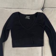 V Neck Ribbed Long Sleve Crop Top From Garage Size Xs Worn Once And In Perfect Condition // Looks And Feels Brand New Price Is Negotiable I Ship Fast Black Seamless V-neck Top, Black Casual V-neck Crop Top, Casual Black V-neck Crop Top, Casual Black Long Sleeve Crop Top, Casual Long Sleeve Seamless Crop Top, Casual Seamless Tops For Night Out, Cotton V-neck Crop Top For Night Out, Black Ribbed Cropped Top, Black Seamless Long Sleeve Top