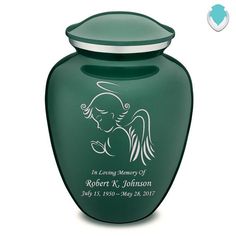 a blue cremation urn with an angel on it