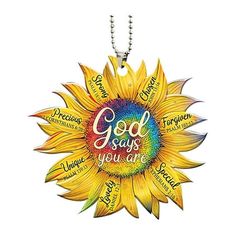 a sunflower with the words god says you are surrounded by other words on it