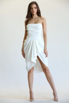 STYLED BY ALX COUTURE MIAMI BOUTIQUE White Pleated Draped Skirt Dress Stretch Draped Dress For Date Night, Fitted Asymmetrical Pre-draped Dress, Fitted Pre-draped Knee-length Dress, Draped Asymmetrical Stretch Dress For Party, Stretch Draped Asymmetrical Dress For Party, Fitted Flirty Draped Dresses, Fitted Knee-length Strapless Flirty Dress, Flirty Fitted Draped Dress, Stretch Elastane Dresses For Brunch