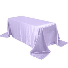 a purple table cloth on top of a white table