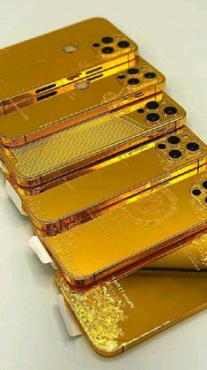 four gold bars stacked on top of each other