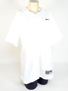 NIKE FULL BUTTON SHORT SLEEVE SOFTBALL/BASEBALL JERSEY Nike Full Button Short Sleeve Softball/Baseball Jersey, Women's Sizes, Brand New with Tags Attached. Features and Details Include:   - BRAND: NIKE - STYLE: BUTTON FRONT BASEBALL JERSEY - SPORT: SOFTBALL/BASEBALL - COLOR: WHITE - STYLE #: 453380 - (5) Button Front - Nike "Swoosh" Logo Boldly Embroidered in Black on the Upper Left - Nike Logo Tag Sewn on Lower Left - Engineered Slightly Longer in the Back - Knit Mesh Underarm Panels - 100% Pol White Baseball Jersey For Sports Season, White Baseball Jersey With Collar For Sports Season, Sporty White Baseball Jersey For Game Day, White Collegiate Tops With Baseball Collar, Casual White Baseball Jersey, White Sporty Baseball Jersey For College, Sporty White Top With Baseball Collar, College Baseball Jersey With Baseball Collar In White, White Baseball Jersey For College With Baseball Collar