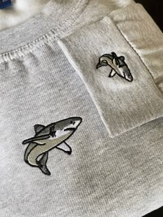 Embroidered 'Shark' Sweatshirt with matching embroidery on the left cuff! Our Sweatshirts are made of 50% Cotton and 50% Polyester - 300gsm Multiple sizes available from XS to XXXL Please check the size guide and thread colour choices are in the photos for you! Shark Hoodie Outfit, Embroidery Shark, Shark Gift Ideas, Shark Clothes, Shark Embroidery, Shark Sweater, Shark Stuff, Comfy Christmas, Bone Bordado