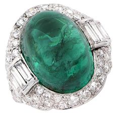 For Sale on 1stDibs - Classic Art Deco ring set with a sugarloaf cabochon emerald, with an AGL certificate stating its weight is 14.76 carats and the emerald is Colombian with Luxury Emerald Ring With Oval Cabochon And 17 Jewels, Luxury Oval Cabochon Emerald Ring With 17 Jewels, Fine Jewelry Green Cabochons For Formal Occasions, Green Cabochons For Formal Fine Jewelry, Luxury Oval Emerald Ring Collectible, Emerald Diamond Ring, Colombian Emeralds, Deco Ring, Art Deco Ring