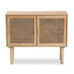 Presenting a light, airy display, the Maclean sideboard buffet supports your dining room needs. Made in China, this sideboard is crafted from sturdy wood and accented with natural rattan. Two doors open to reveal a spacious storage compartment to organize cookware and utensils. Requiring assembly, the Maclean features a wide, rectangular tabletop that serves as a convenient prep station. A superb upgrade to any dining space, the Maclean sideboard buffet is a delightful addition to the modern hom Modern Sideboard Buffet, Mid Century Modern Sideboard, Rattan Sideboard, Wide Sideboard, Buffets & Sideboards, Side Board, Wooden Sideboard, Contemporary Bedroom Decor, Modern Sideboard