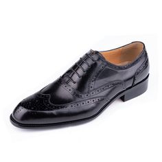 Step into sophistication with our elegant carved British leather Wedding shoes. Crafted from the finest first layer cowskin, these shoes feature a solid pattern and a round toe shape for a timeless and polished look. With a genuine leather lining and a rubber outsole for added comfort and durability, these lace-up shoes are perfect for any business occasion. Elevate your style and make a lasting impression with our exquisite leather business shoes. Classic Closed Toe Lace-up Wedding Shoes, Black Wingtip Dress Shoes For Wedding, Black Wingtip Oxfords For Wedding, Black Leather Brogue Wedding Shoes, Oxford Dress Shoes With Brogue Detailing For Wedding, Black Brogue Leather Shoes For Wedding, Black Leather Brogue Shoes For Wedding, Oxford Leather Plain Toe Wedding Shoes, Wedding Wingtip Oxfords With Brogue Detailing