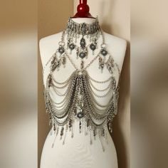 I Can't Express The Amount Of Hours I've Put Into Designing This. It's One Of A Kind And Looks Amazing Over Any Kind Of Tight Top, Bodysuit Or Bodycon Type Of Dress. I've Never Worn This Out And If You're The Kind Of Gypsy, Bohemian Woman Like I Am, You'll Enjoy This Staple Piece. The Way To Put It On Is To Take The Neck Part And Drape It Over Your Head And Simply Clasp The Back. I Paired It With The Necklace That Is Listed. This Listing Is For Everything In The Photo, Including The Matching Ear Glamorous Silver Body Chain For Festivals, Bohemian Body Chain For Evening, Bohemian Silver Body Chain For Wedding, Bohemian Style Body Chain For Evening, Bohemian Style Body Jewelry For Evening, Elegant Metal Body Chain For Evening, Silver Chain Body Jewelry For Wedding, Elegant Handmade Silver Body Jewelry, Silver Bohemian Body Jewelry For Evening