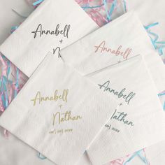 four personalized napkins with names on them