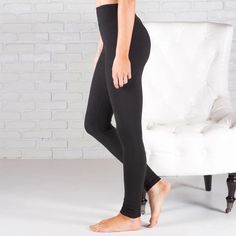 Looking for a pair of leggings that take comfort to the next level? Our buttery soft solid leggings have you covered! With their tummy control comfort stretch yoga-style waistband, they'll keep you feelin' cozy all day. Whether you're dressing them up with some fancy heels & elevated accessories or staying in and spending the evening on the couch, you'll be living in luxurious comfort. Wherever your day takes you, be comfortable - be happy - be stylish. Features: 3" comfort stretch yoga waistban Comfortable Compression Leggings For Yoga, Solid Color Comfort Stretch Yoga Pants For Loungewear, Comfort Stretch Solid Yoga Pants For Loungewear, Comfortable Stretch Tights For Yoga, Comfort Stretch Solid Color Tights For Pilates, Athleisure Yoga Pants For Relaxation, Comfortable High Stretch Yoga Leggings, Comfortable Full Length Leggings For Pilates, High Stretch Solid Leggings For Loungewear