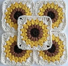 crocheted coasters with yellow and brown flowers