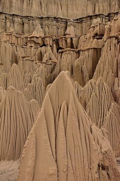 sand sculptures made to look like mountains in the desert