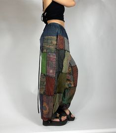 Bohemian mixed patchwork hippie pants in dark blue/ mixed color patches. Each pair is slightly unique and will have some different patches and colorings!. Waist stretches from 24-35' inches comfortably. Model is 5'2 for reference. Measurements: Inseam: 31’ Waist: 24’ to 35’ Patchwork Hippie Pants, Waist Stretches, Earthy Outfits, Hippie Pants, Fairy Grunge, Clothing Styles, Harem Pants, Color Mixing, Dark Blue