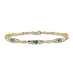 Mesmerizing oval-cut natural emerald gemstones are flanked by shimmering round diamond accents within heart-shaped settings in this meaningful women's bracelet. Fashioned in 14K yellow gold, the 7-inch bracelet secures in place with a lobster clasp. Eternity Bracelet, Gold Book, Bracelet Diamond, Emerald Bracelet, Jared The Galleria Of Jewelry, Emerald Stone, Gold Price, Bracelet Clasps, Emerald Gemstone