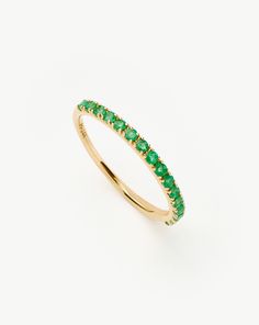 Fine Half Emerald Eternity Ring. A Forever Piece, this Simple Half-Eternity Ring Features Our First-Ever Emeralds. Wear Solo or Pair with Other Pared-Back Bands for a Refined Ring Stack. Handcrafted from 100% Certified Recycled Solid Gold, and Hallmarked for Authenticity. Metal: 14Ct Recycled Yellow Gold Thickness: 1. 9mm Gemstone: Emerald Karat Weight: 0. 29K Weight: 2. 2g Product Code: Fj-G-R2-Em Emerald Eternity Ring, Ring Stack, Gold And Silver Rings, Half Eternity Ring, Ring Size Guide, Recycled Sterling Silver, Conflict Free Diamonds, Stacking Rings, Eternity Ring