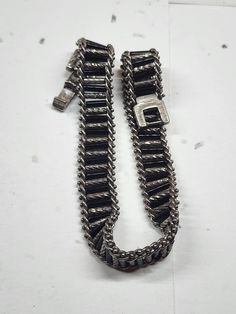 This is for a vintage, black beaded, silver tone, j bracelet. This has no markings and is unsigned. It has not been altered, cleaned, or repaired. It has usual wear and tear. It has a nice weight, and in good condition for the age. I took several pictures so you could see clearly the condition this is in. This is a used item and sold as is. If you have any questions, please contact me. I sell an item as is, so normally don't refund. This item has free shipping, and I do not ship international Black Beaded Metal Bracelets, Formal Silver Beaded Bracelets, Formal Silver Beaded Bracelet, Formal Silver Beaded Bracelets With Strap, Black Metal Chain Bracelet With Jubilee Style, Formal Silver Chain Metal Bracelet, Silver Chain Bracelet With Silver Beads, Vintage Black Beaded Bracelets, Black Metal Bracelet With Silver Beads