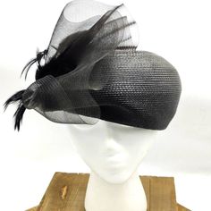 Fancy straw hat by Sandra New York. Black straw material accompanied by black feathers and a black veil.  Vintage era: 1960s Vintage Straw Hat, Pillbox Hat, Black Veil, Black Feathers, Straw Hat, Veil, Caps Hats, Feathers, Accessories Hats