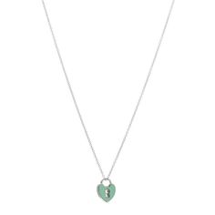 This is an authentic TIFFANY Sterling Silver Heart Lock Pendant Necklace in Blue. The necklace is crafted of sterling silver and features an enamel heart lock motif pendant in the signature Tiffany blue on a delicate silver chain. Silver Charm Necklace With Heart Pendant, Silver Heart Pendant Charm Necklace With Cable Chain, Silver Heart Pendant Charm Necklace On Cable Chain, Silver Charm Necklace With Heart Pendant And Cable Chain, Sterling Silver Heart Pendant Charm Necklace With Cable Chain, Silver Heart Jewelry With Cable Chain, Silver Heart-shaped Jewelry With Cable Chain, Tiffany T, Lock Pendant