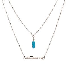 two chain necklaces with a blue stone on the front and one in the middle