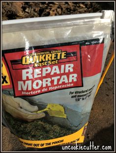 a bag of repair mortar sitting on the ground