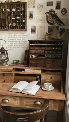 a wooden desk with an open book on it