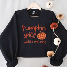 A cute pumpkin spice sweatshirt bound to keep you warm in the colder months. A pre-shrunk, classic fit sweater that's made with air-jet spun yarn for a soft feel and reduced pilling. * 50% cotton, 50% polyester * Pre-shrunk * Classic fit * 1x1 athletic rib knit collar with spandex * Air-jet spun yarn with a soft feel and reduced pilling * Double-needle stitched collar, shoulders, armholes, cuffs, and hem This pumpkin spice sweatshirt is made especially for you as soon as you place an order, which is why it sometimes takes us a bit longer to deliver it to you. Making products on demand instead of in bulk helps reduce overproduction, so thank you for making thoughtful purchasing decisions! Black Pre-shrunk Sweatshirt For Fall, Cozy Orange Crew Neck Top, Fall Cotton Orange Sweater, Pre-shrunk Relaxed Fit Fall Sweatshirt, Relaxed Fit Sweatshirt For Fall, Pre-shrunk Sweater For Fall Streetwear, Fall Crew Neck Sweater With Comfortable Fit, Orange Cotton Sweatshirt For Fall, Fall Sweatshirt With Letter Print And Comfortable Fit