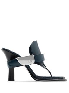 navy blue calf leather signature Equestrian Knight motif silver-tone hardware thong strap slip-on style high heel Luxury Blue Mules, Luxury Blue Leather Mules, Elegant Blue Mules With Sculpted Heel, Luxury Blue Sandals With Single Toe Strap, Versace Outfit, Burberry Shoes, Chanel 2, Iconic Bags, Ballet Pumps