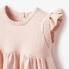 This garden picnic knit baby dress is giving us all the feels! A sweet blush pink colored fine knit is the perfect weight for spring weather. Pom-pom cotton tail adds the right touch of whimsy to this already adorable luxury baby dress. Pair with a linen toy or coordinating garden picnic blanket to make the ultimate baby gift set. 100% cotton knit baby dress A-line silhouette with flutter sleeve Pom Pom cotton tail detail Includes diaper cover/bloomer Machine wash cold, tumble dry low Planet Clothing, Baby Gift Guide, Knit Baby Dress, Garden Picnic, Elegant Baby, Luxury Baby, Spring Weather, All The Feels, The Feels