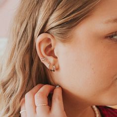 The Ella Bow Studs are the perfect, dainty earring that goes with everything! They are available in gold vermeil or sterling silver and are hypoallergenic, tarnish and wear resistant, and perfect for sensitive ears. They are perfect for a first piercing or as a second/third piercing. Cutest trend of the year! Tarnish Resistant Silver Cartilage Earrings In 14k Gold Filled, Classic Everyday Hypoallergenic Ear Climbers, Gift Huggie Ear Climbers With Ear Wire, 14k Gold Hypoallergenic Dainty Ear Climbers, Dainty Ear Climbers For Everyday, Dainty 14k Gold Hypoallergenic Ear Climbers, Dainty Tiny Ear Climbers For Everyday, Dainty 14k Gold Ear Climbers For Pierced Ears, Dainty 14k Gold Ear Cuff For Everyday