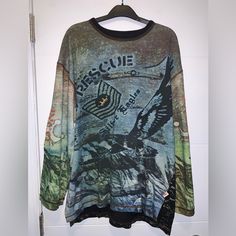 Size Men’s Large Gently Pre Owned; Excellent Condition 100% Cotton Measurement’s Armpit To Armpit: 48 Inches Length: 30 Inches Z5 Alternative Style Oversized Long Sleeve Tops, Oversized Long Sleeve Alternative Style Tops, Oversized Long Sleeve Tops In Alternative Style, Grunge Long Sleeve Tops With Graffiti Print, Urban Graffiti Print Top For Fall, Urban Graffiti Print Tops For Fall, Long Sleeve Graffiti Print Top For Streetwear, Casual Long Sleeve Shirt With Graffiti Print, Winter Streetwear Shirt With Crew Neck