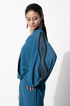 Buy Blue Viscose Georgette Embroidered V Neck Overlap Panelled Top For Women by Rohit Gandhi + Rahul Khanna Online at Aza Fashions. Elegant Blue Blouse With Pleated Sleeves, Elegant Blue Blouse With Gathered Sleeves, Chic Blue Blouse With Gathered Sleeves, Evening Tops With Blouson Bishop Sleeves, Evening Tops With Bishop Sleeves, Party Blouse With Long Sleeve Embroidered Sleeves, Blue Blouse With Blouson Lantern Sleeves, Blue Lantern Sleeve Blouse With Blouson Sleeves, Formal Long Sleeve Blouse With Embroidered Sleeves