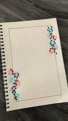 an open notebook with stickers on it