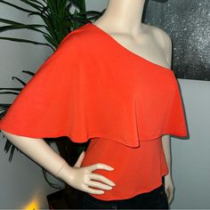 Guess By Marciano Tangerine Orange One-Shoulder Cape Sleeve Party/Cocktail Top. Size Medium. Lying Flat, From Underarm To Underarm It’s 17 Inches Across. Stretchy Fabric. Total Length Is 20.5 Inches. New With Tags/Not Previously Worn. The Interior Label Is Partially Cut But It’s Otherwise Flawless. I Purchased This For Myself But Never Wore It & Can’t Return It. $130 Comparable Retail Value. Buy With Confidence; I’m A Posh Ambassador, Top-Rated Seller & Fast Shipper. Summer Fitted One Shoulder Top For Date Night, Summer One Shoulder Fitted Top For Date Night, Fitted One Shoulder Top For Summer Date Night, Fitted One Shoulder Top For Date Night In Summer, Fitted One Shoulder Top With Asymmetrical Neckline For Cocktail, Off-shoulder Tops For Evening Party Season, Fitted One Shoulder Top For Date Night, Flirty Off-shoulder Tops For Party, Glamorous Fitted One Shoulder Top For Evening