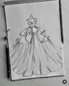 a drawing of a dress on a piece of paper